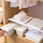 Reusable adhesive hook for hanging towels and keys
