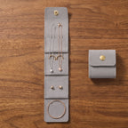 Soft travel jewellery bag with compartments and tie closure