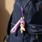 Cartoon style baby doll silicone keychain charm in bright colors