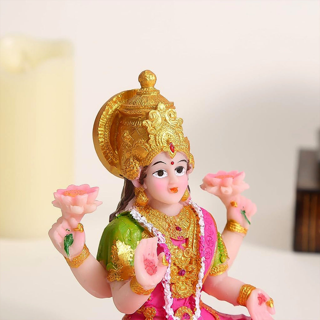 Front view of Lakshmi Mata multicolor statue sitting on lotus pedestal
