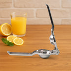 Closeup of steel lemon squeezer highlighting sturdy build and bottle opener
