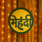 Indoors mehndi ceremony round decorative sign with typical Hindi मेहंदी lettering