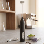 Compact handheld frother for cappuccino and frappe foam