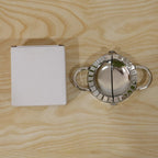 Daily use stainless steel dumpling maker on kitchen counter