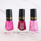 Metallic nail colour in dark mini nail polish bottle with glitter effect