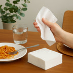 Disposable paper napkins stack for convenient single use.