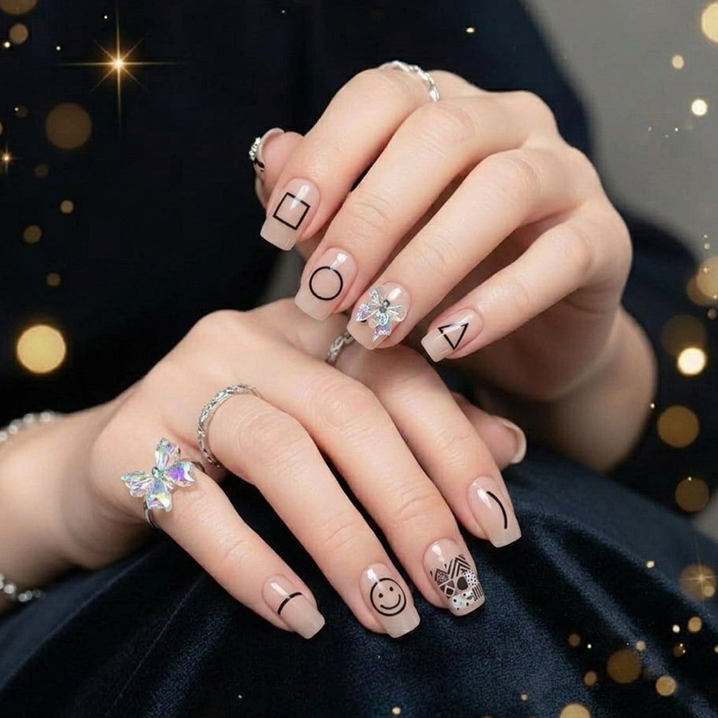 Close-up of stylish glossy false nails with a trendy design.