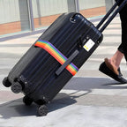 Coiled Rainbow Luggage Strap, showcasing its flexible and durable webbing.