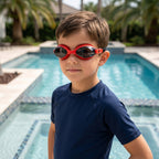 Angled view of red swimming goggles highlighting leakproof design