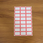 Various items organized and labeled using self-adhesive rectangular label stickers