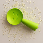 Textured rice paddle designed to prevent rice from sticking while serving