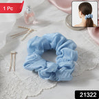 Close-up of a stretchable elastic soft fabric hair scrunchie accessory