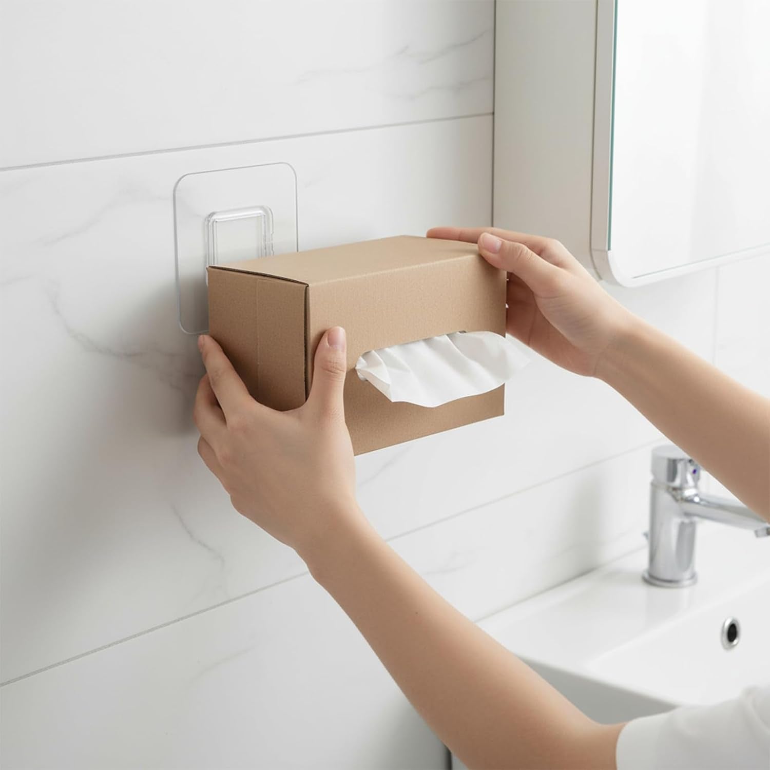 Transparent adhesive wall hook securely mounted in a modern bathroom setting.