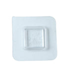 Transparent no-drill wall hook demonstrating versatile use in a home setting.
