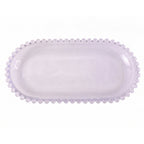 Transparent oval glass tray for serving snacks and sweets