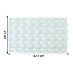 Close-up of textured surface on massage bath mat for foot stimulation