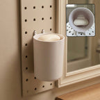 Utility soap box holder showing drainage slots for soap hygiene
