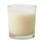 Scented votive candle adding a festive touch to Diwali decorations.