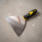 Putty scraper wall repair tool