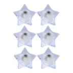Battery operated LED candles in star-shaped holders for safe lighting