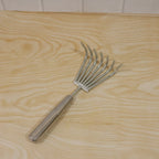 Garden rake being used for garden maintenance and raking