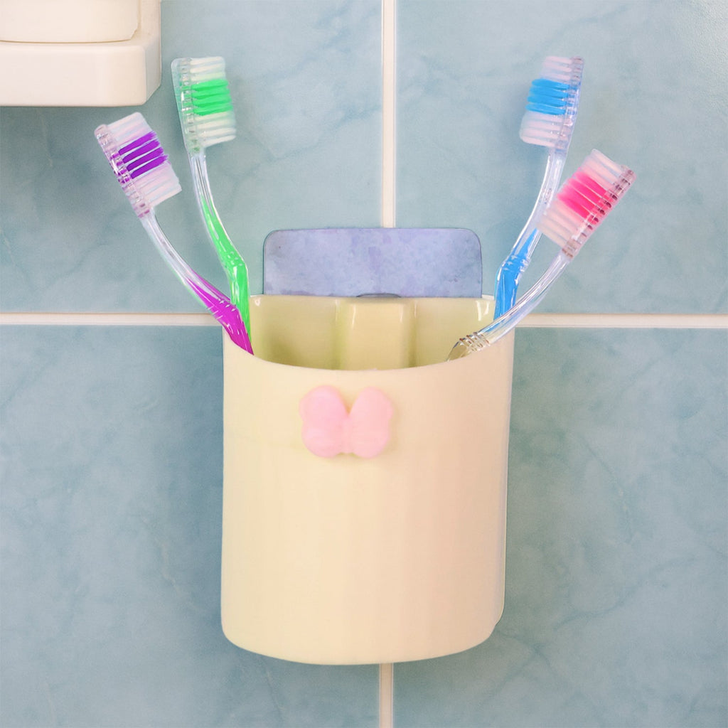 Spacious toothbrush holder mounted on a smooth bathroom wall