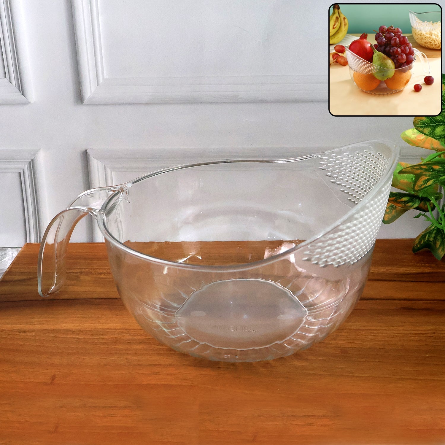 Large transparent plastic bowl with handle for kitchen use