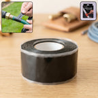 Waterproof self-fusing silicone repair tape rolled on a surface