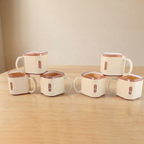 Close-up view of square tea cups showing modern design