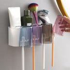 Bathroom toothbrush storage rack mounted on wall with organized sections