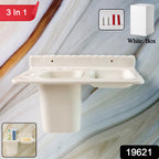 Detail view of toothbrush slots and detachable cup in wall mounted toothbrush holder.