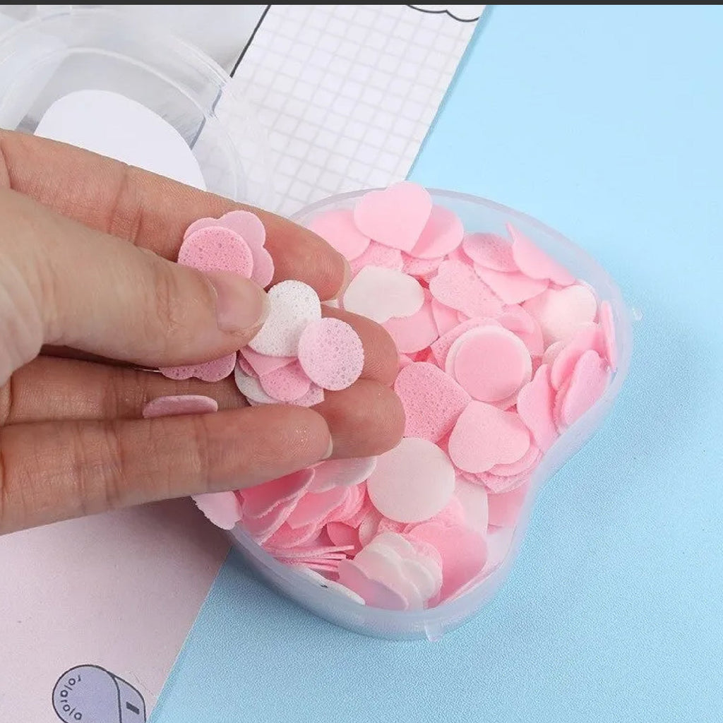 Apple design paper soap dissolving in water, creating a rich lather.