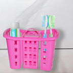 White 4-in-1 Bathroom Organizer Stand holding toothbrushes and toothpaste on a counter.