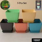 Stylish modern square plastic plant pots with vertical ribbed texture for balcony or patio