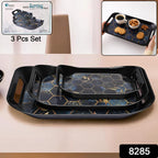 Three nested plastic serving trays stacked showing size variety