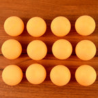 Orange table tennis balls ideal for training and tournament use displayed