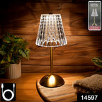 Close-up of crystal table lamp showcasing crystal-cut shade and warm ambient LED light