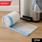 Roll-packed garbage bags with tie handles for convenient storage