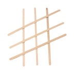 Wooden coffee stir sticks neatly arranged on surface