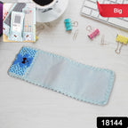 Soft cartoon fabric remote control case with decorative lace trim.