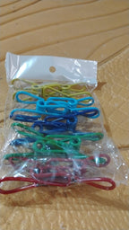 Various uses for metal clothes pins clips including craft projects and photo display