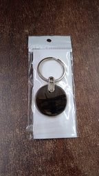 Simple black round metal keychain accessory for everyday use