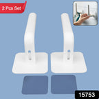Close-up of the white hanging storage rack showing its drain holes and capacity for small items like sponges or toiletries.