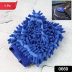 Hand wearing a microfiber wash mitt for scratch-safe car cleaning.