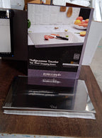 Chef slicing vegetables on anti-bacterial stainless steel chopping board