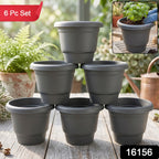 Set of 6 round plastic plant pots for flowers and herbs