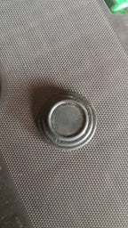 Rubber car door shock absorber sticker displayed on white background showing shape and size