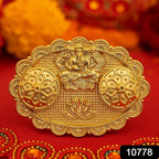 Close-up of Ganesh embossed kumkum chopra showing intricate lotus and Ganpati motifs