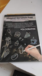 Scratch art sheets displaying vivid, colourful artwork patterns