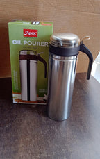 Full height view of stainless steel oil pourer showcasing sleek design